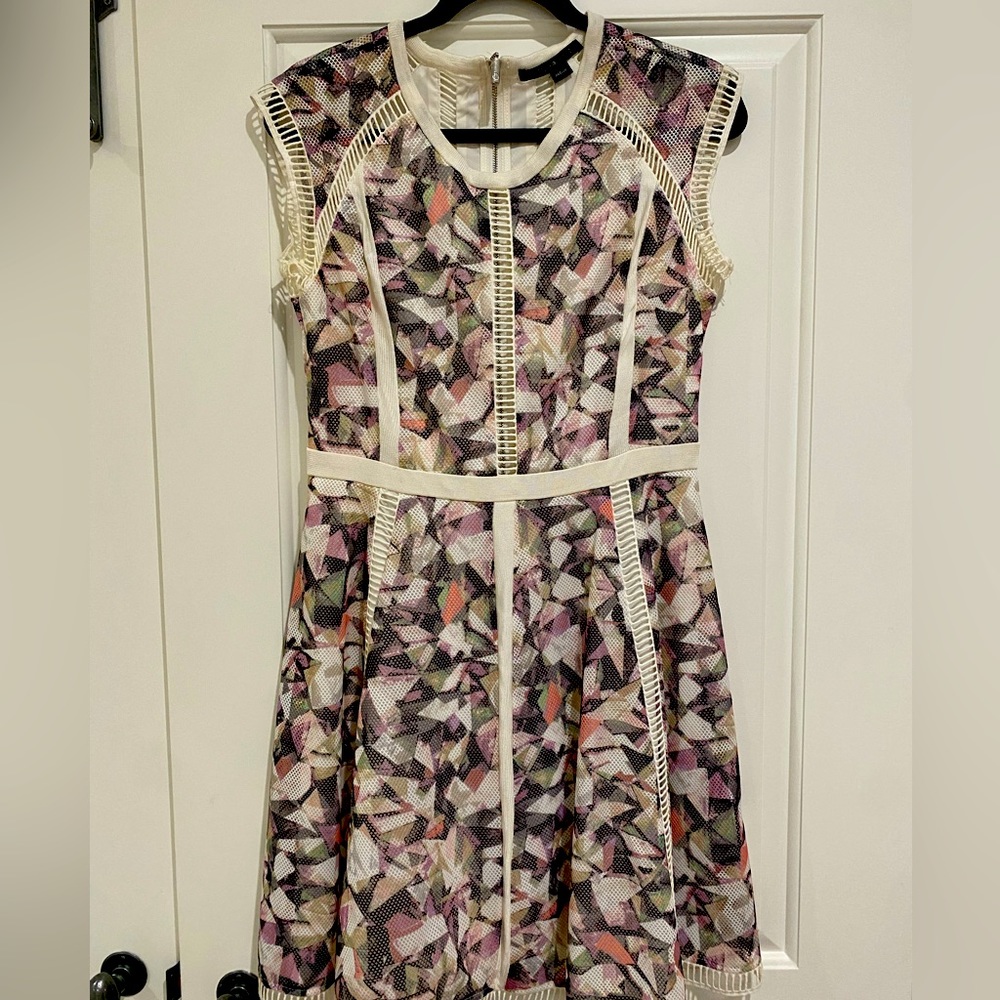 Gorgeous summer party dress with adorable cut outs